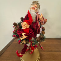 Santa Playing-Dancing The Hula Hoop Wreath with an Elf Holiday Figure Decor