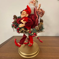 Santa Playing-Dancing The Hula Hoop Wreath with an Elf Holiday Figure Decor
