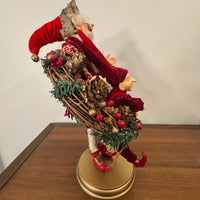 Santa Playing-Dancing The Hula Hoop Wreath with an Elf Holiday Figure Decor