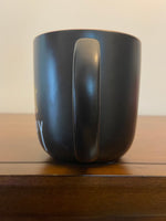 Happy Dog Fireworks Ceramic Mug – Black with Gold & Pink Dog Design
